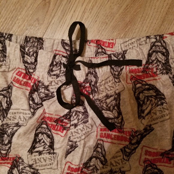 Womens cozy fleece pajama bottoms in red & black Batman foe motif on grey back - Picture 3 of 6